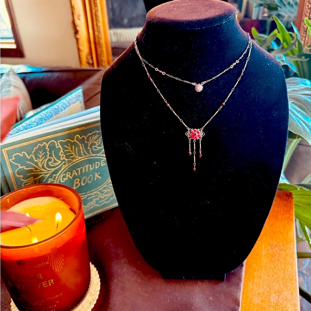 Two vintage Liz Paiacios O.S.F. In antique brass & Swarovski crystals.